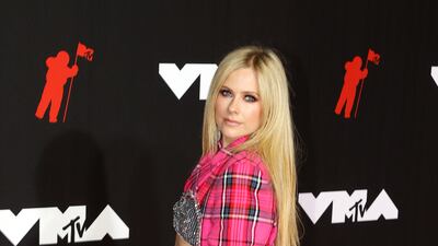 Canadian singer Avril Lavigne, in Area, arrives on the MTV Video Music Awards red carpet.