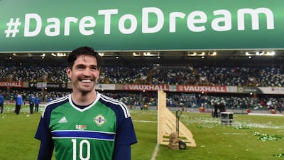 Northern Ireland striker Kyle Lafferty poses for photos at Windosr Park before leaving for France to participate in Euro 2016. Clodagh Kilycoyne / Reuters