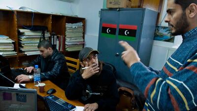 Libyans at the opposition headquarters.