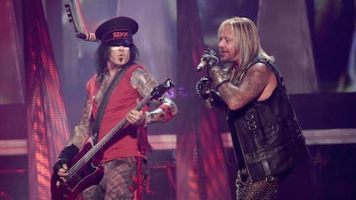 Bassist Nikki Sixx and singer Vince Neil of Motley Crue perform onstage. AFP