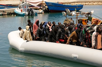 Migrants being brought back to port after being intercepted by the Libyan coast guard, in Gasr Garabulli, north-western Libya. AP Photo