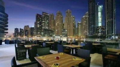 The terrace at Zafran in Dubai's Marina Mall is lit up at night and the atmosphere is intimate, rather than sterile or with a shopping mall feel.