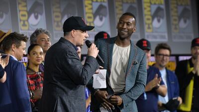 President of Marvel studios Kevin Feige welcomes actor Mahershala Ali on stage during the Marvel panel, as it is confirmed he will be taking the title role in an upcoming 'Blade' reboot on day three of Comic-Con International: San Diego on Saturday, July 20, 2019. AFP