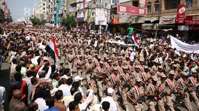 Pro-government troops parade to mark the 55th anniversary of the September 1962 revolution in the war-torn southwestern city of Taiz, Anees Mahyoub / Reuters