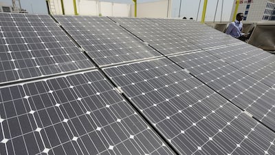 Dubai will rely on renewable sources such as solar energy to power its circular economy programme. Pawan Singh / The National