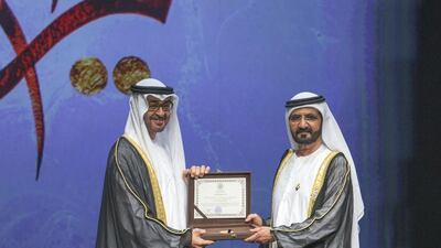 Sheikh Mohammed bin Zayed presents the ‘Cultural Personality of the Year Award’ to Sheikh Mohammed bin Rashid. Donald Weber / Crown Prince Court - Abu Dhabi