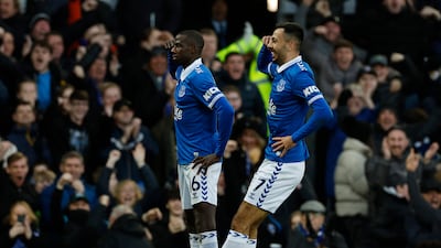 Everton's Abdoulaye Doucoure celebrates with teammate Dwight McNeil after scoring their first goal against Chelsea in the Premier League game at Goodison Park on December 10, 2023. Action Images