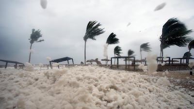 Debris and sea foam litters a beach during Cyclone Mekunu in Salalah, Oman, May 26, 2018. Cyclone Mekunu blew into the Arabian Peninsula early Saturday, drenching arid Oman and Yemen with rain, cutting off power lines, officials said. Kamran Jebreili / AP Photo