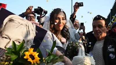 Stella Moris cuts a wedding cake given by supporters outside Belmarsh prison after marrying WikiLeaks founder Julian Assange in 2022. Photo: Getty Images