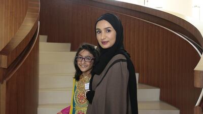 Bedour Al Raqbani and Noora Al Kaabi at the Hear My Voice conference on Saturday. Jeffrey E Biteng / The National