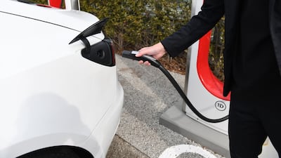 One challenge the electric vehicle industry faces is the infrastructure needed to increase the number of charging stations available to the public. Bloomberg