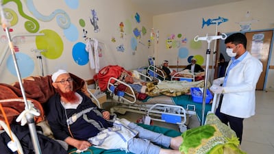 A Yemeni medic checks on cancer patients at the National Oncology Centre in the capital Sanaa on March 3, 2021. AFP