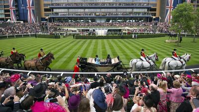 Pomp and circumstance, such as Queen Elizabeth’s arrival at Ascot racecourse on Ladies Day at last year’s Royal Ascot meet, is a big part of the allure along with the unique challenge the track provides. Carl Court / AFP