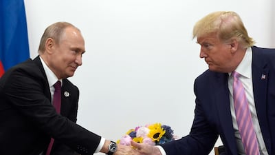 US President Donald Trump and Russian President Vladimir Putin, left, during a bilateral meeting on the sidelines of the G-20 summit in Osaka, Japan, June, 2019. AP