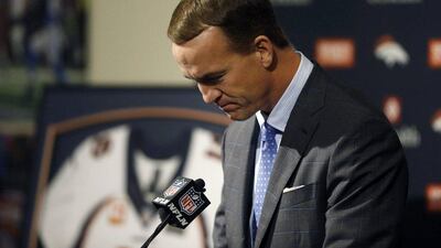 Denver Broncos quarterback Peyton Manning pauses while speaking during a news conference to announce his retirement on Monday. David Zalubowski / AP / March 7, 2016