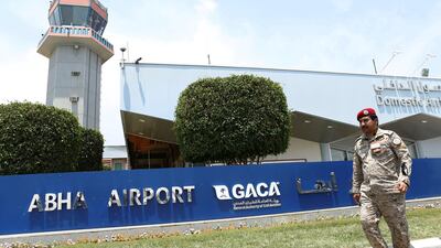 A security officer walks outside Saudi Arabia's Abha airport after an attack by Yemen's Houthi rebels in June 2019. Reuters