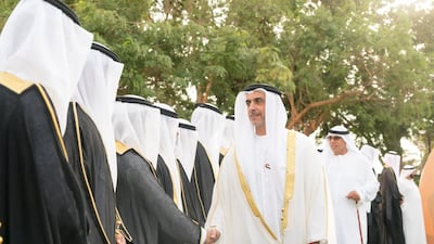 ABU DHABI, UNITED ARAB EMIRATES - November 27, 2018: HH Lt General Sheikh Saif bin Zayed Al Nahyan, UAE Deputy Prime Minister and Minister of Interior (R), greets a groom during a mass wedding reception for HH Sheikh Mohamed bin Khalifa bin Khaled Al Nahyan (not shown), at The Emirates Palace. ( Rashed Al Mansoori / Ministry of Presidential Affairs ) ---