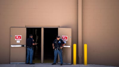Law enforcement agencies cover the exits of a Walmart where a shooting occurred near Cielo Vista Mall in El Paso, Texas. AFP