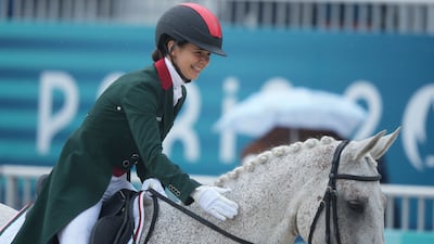Morocco's Noor Slaoui and her horse Cash In Hand during the Equestrian Eventing Dressage competition, at the 2024 Summer Olympics, Saturday, July 27, 2024, in Versailles, France. (AP Photo / Mosa'ab Elshamy)