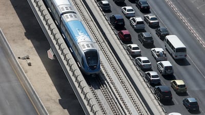 A train heading from Al Karama station towards Rashidiya station. Pawan Singh / The National