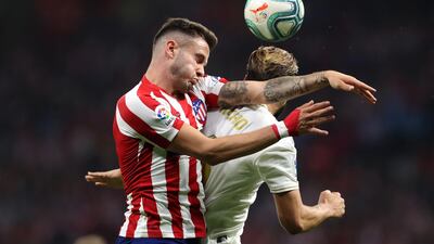 MADRID, SPAIN - SEPTEMBER 28: Saul of Atletico Madrid battles for the ball with Nacho of Real Madrid during the Liga match between Club Atletico de Madrid and Real Madrid CF at Wanda Metropolitano on September 28, 2019 in Madrid, Spain. (Photo by Angel Martinez/Getty Images)