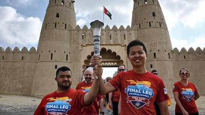Torch runners at Al Jahili Fort in Al Ain. Courtesy MOI