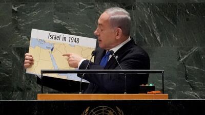 Israeli Prime Minister Benjamin Netanyahu holds up a map of Israel that includes all of the West Bank and Gaza during his UN address in 2022. AFP