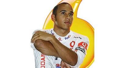 McLaren driver Lewis Hamilton waits during the practice session for the Japanese Grand Prix.