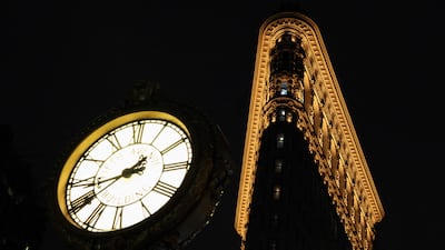 The 123-year-old Flatiron Building in New York is illuminated at night for the first time, following a restoration costing more than $100 million. AFP