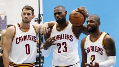 LeBron James, centre, fielded questions regarding Colin Kaepernick's national anthem protest during the Cleveland Cavaliers media day. Ron Schwane / AP Photo