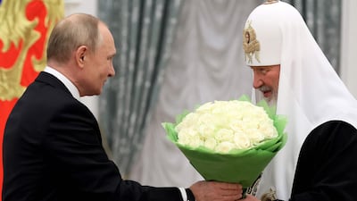 Patriarch Kirill of Moscow (R) is a staunch supporter of Russian President Vladimir Putin. AFP