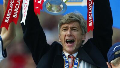 Wenger oversaw Arsenal winning the Premier League in 2002, one of three times the club would win the title under him. Ben Radford / Getty Images