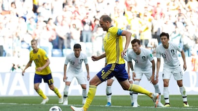 Andreas Granqvist scores from the penalty spot. Matthew Childs / Reuters