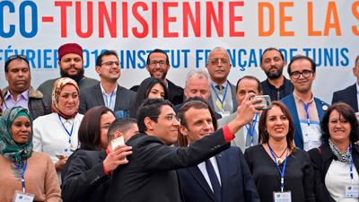 France's president Emmanuel Macron meets with members of Tunisia's French community in Tunis on February 1, 2018. Eric Feferberg / AFP