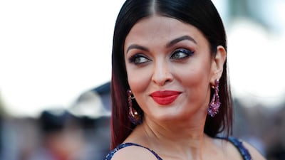 The actress paired the dress with beautiful De Grisogono drop earrings. AFP