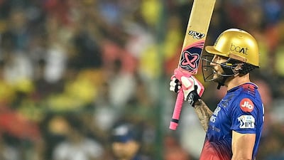 Bengaluru captain Faf du Plessis celebrates after reaching his half-century. He was run out by Mitchell Santer for 54 off 39 balls. AFP