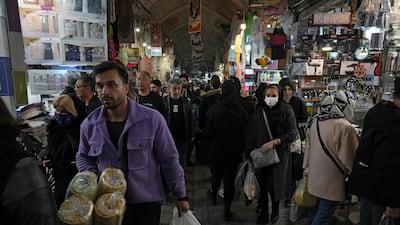 Iranians at the old grand bazaar in Tehran. AP Photo