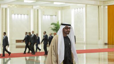 Sheikh Mohammed bin Zayed, Crown Prince of Abu Dhabi and Deputy Supreme Commander of the Armed Forces, is received by Xi Jinping, President of China (not shown), at the Great Hall of the People during a state visit to China. Ryan Carter / Crown Prince Court - Abu Dhabi