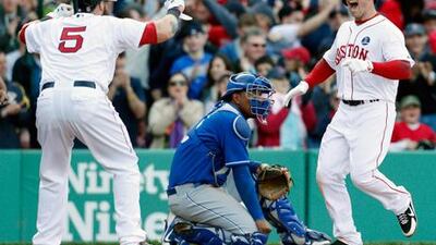 Boston's Daniel Nava celebrates his three-run home run against Kansas City with teammate Jonny Gomes.