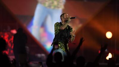 Chris Brown performs on stage. AFP