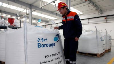 An employee walks through the storage facility at the Borouge Compounding Shanghai facility on the outskirts of Shanghai, China on 22 December 2010. Qilai Shen for the National