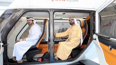 Sheikh Mohammed bin Rashid, Vice President and Ruler of Dubai, and Sheikh Hamdan bin Mohammed, Crown Prince of Dubai, review prototypes of sky pod technology. Courtesy: Wam