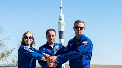 Cosmonaut Anton Shkaplerov, centre, is a veteran of three space missions. AP
