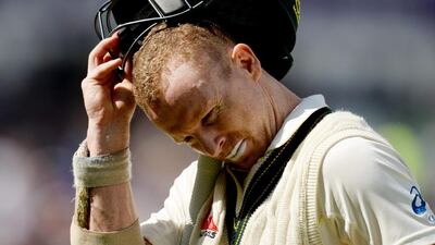 Australia’s Chris Rogers leaves the field after being dismissed. Philip Brown / Reuters
