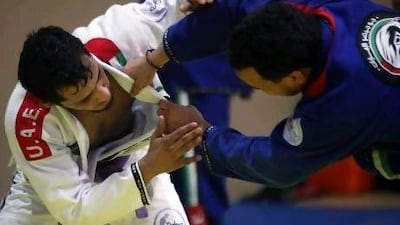 Mohamed Al Zaabi, left, and Mohamed Al Qubaisi, grapple in training. Al Qubaisi says his UAE teammates are his ‘brothers’ and that jiu-jitsu has ‘made him a better person’. Al Zaabi carries medal hopes at blue belt, while Al Qubaisi is a contender for a gold medal in purple belt.