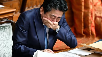 This file photo taken on March 6, 2020 shows Japan's Prime Minister Shinzo Abe gesturing as he attends a upper house plenary session at parliament in Tokyo. AFP