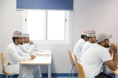 Omani students attend a lecture at the Oman Tourism College, the only college in the Sultanate of Oman specialises in Tourism & Hospitality. Sebastian Castelier for The National