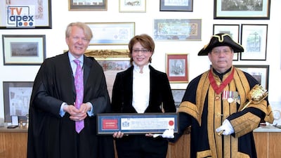 Murray Craig, the clerk of the Chamberlain’s Court at City Corporation of London, with the Yemeni scientist and UAE resident Manahel Thabet and, right, Professor Frederick Trowman-Rose, the Ward Beadle of Bassishaw of the City of London, during Ms Thabet’s Freedom of the City of London presentation at the City of London Guildhall. Courtesy Clerk of the Chamberlain’s Court