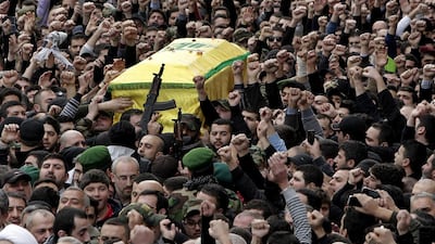 Hizbollah fighters carry the coffin of Jihad Moughniyeh, the son of assassinated commander Imad Moughniyeh, during his funeral procession in southern Beirut, Lebanon on January 19, 2015. Jihad was one of six Hizbollah fighters killed in an Israeli airstrike on the Syrian side of the Golan Heights the day before. Bilal Hussein/AP Photo