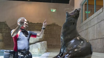 All together now: Swan sings along with Jeffrey Fanugao, one of her trainers. Antonie Robertson / The National